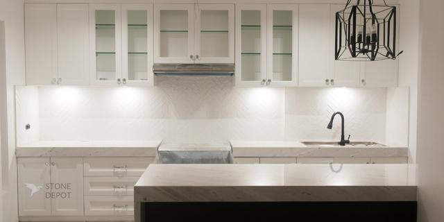 All-white kitchen design with marble counter in Davao City, Philippines